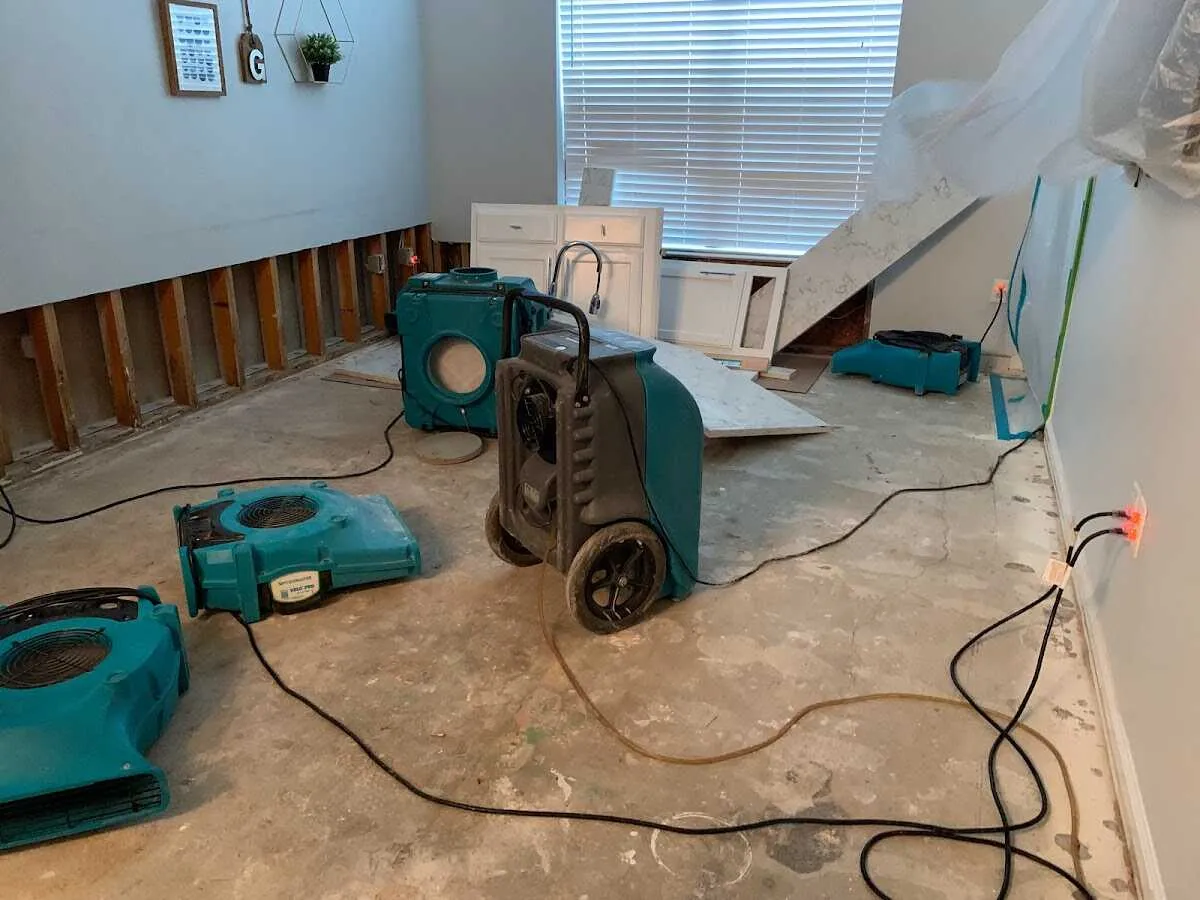 Dehumidifier in flood-cut room for Water Damage Restoration in Rolesville